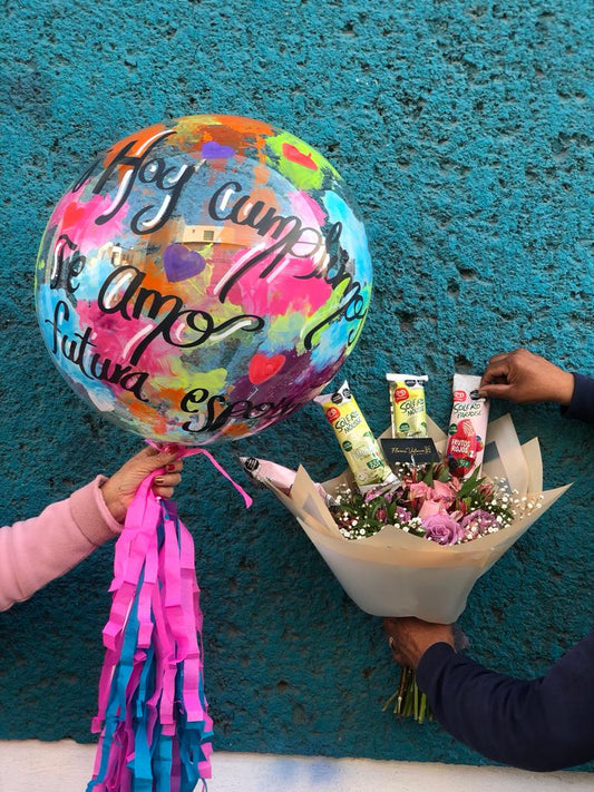 Detalle especial con paletas y globo