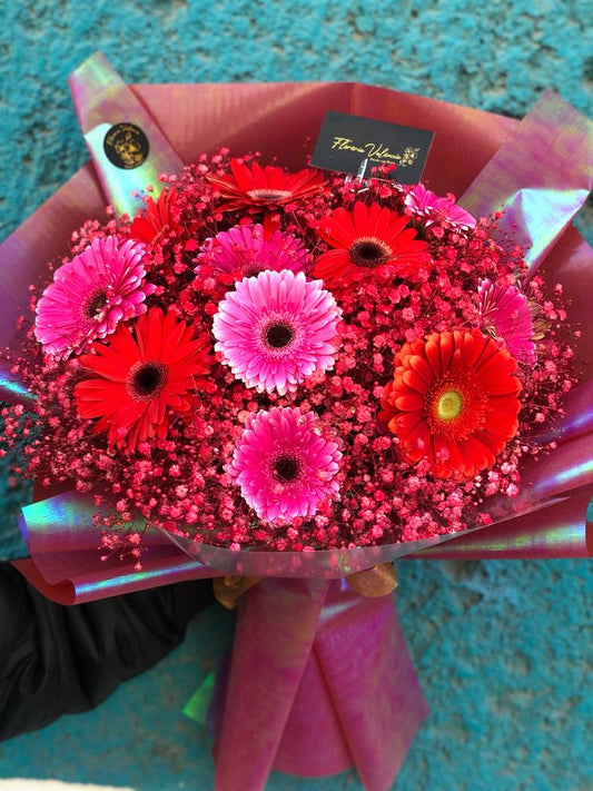 Arreglo rojo tornasol con gerberas