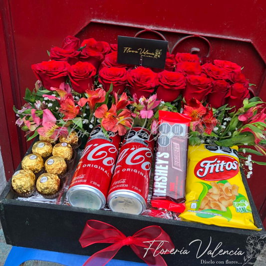 Dulce detalle con dulces y rosas